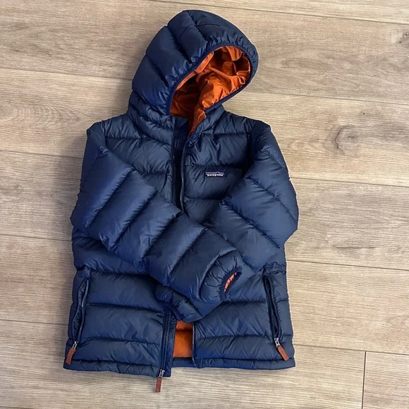 Patagonia Dark Blue Puffer Jacket with Bright Orange Interior - Picture 1 of 4